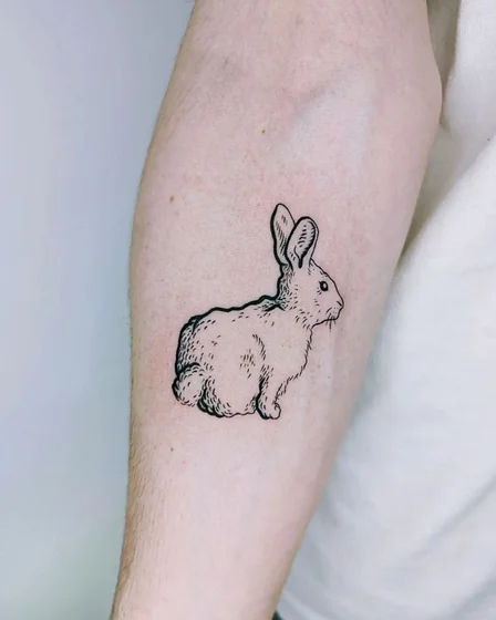 Fine Line Sketch rabbit tattoo idea for men on forearm