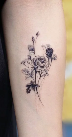 Fine Line Sketch rose and floral tattoo design for women on upper arm
