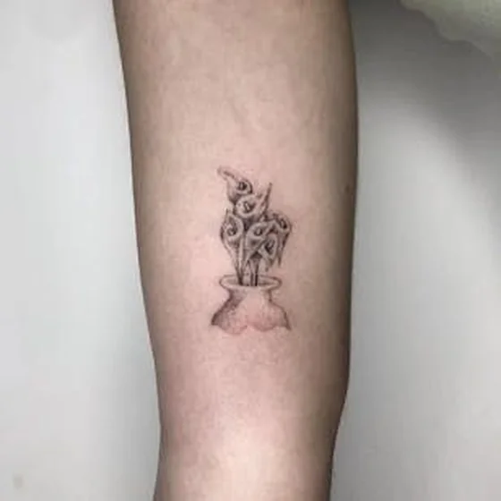 Fine Line and Dotwork Abstract Plant in Vase tattoo design on calf