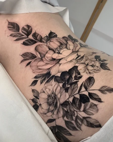 Fine Line and Dotwork floral tattoo design for women on thigh