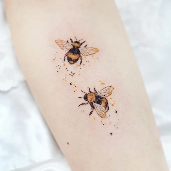 Fine Line bee tattoo idea for women on arm
