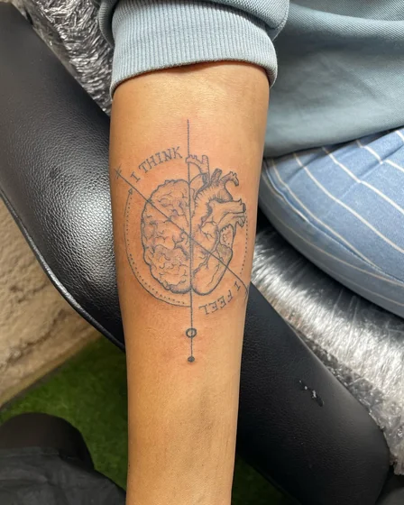 Fine Line brain heart compass tattoo idea for men and women on forearm