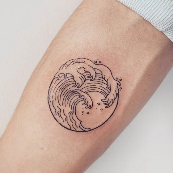 Fine Line minimalist ocean wave tattoo idea for men on forearm