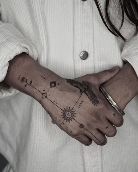 Fine Line minimalist rose, eagle, sun, constellation tattoo design for women on hand and wrist
