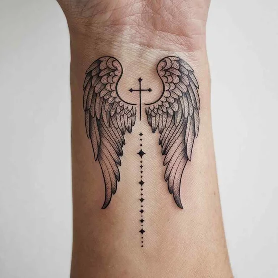 Fine Line minimalist wing and cross tattoo idea for men and women on wrist