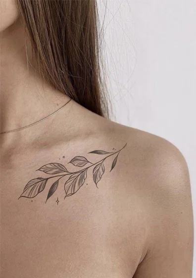 Fine line floral vine tattoo idea for women on shoulder and chest