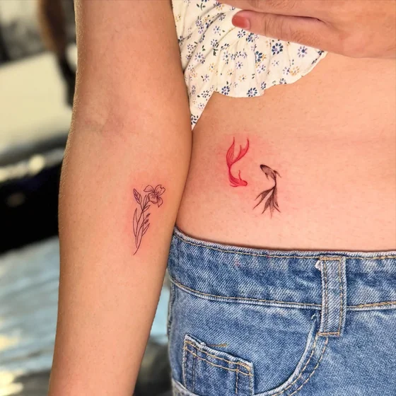 Fine line minimalist flower and fish tattoo design for women on arm and hip