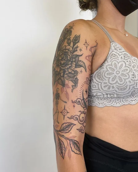 Fine line patchwork rose, fairy, skeleton tattoo idea for women on arm.
