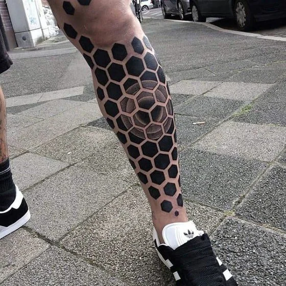 Geometric 3D effect hexagon tattoo idea for men on calf