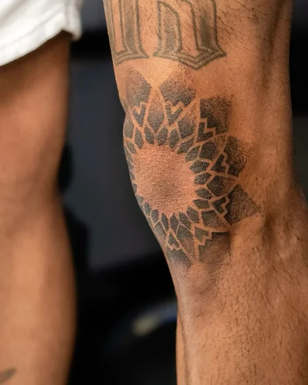 Geometric Dotwork Geometric Pattern tattoo idea for men on elbow
