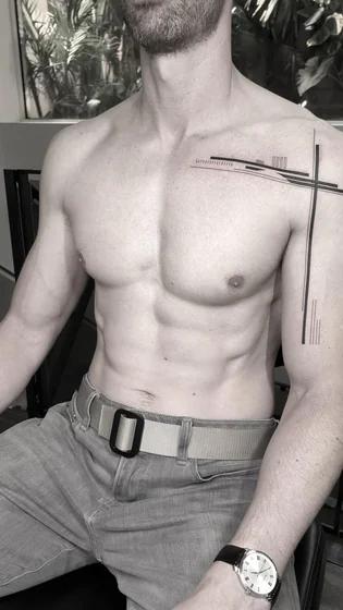 Geometric fine line abstract lines tattoo idea for men on chest and shoulder