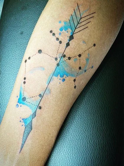 Geometric watercolor Arrow Sagittarius tattoo idea for men, women