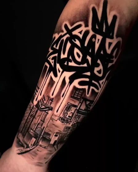 Graffiti tag, crown, cityscape tattoo idea for men on forearm