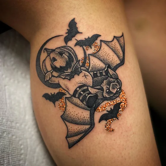 Halloween bat & Jack-o'-lantern dotwork tattoo idea on calf