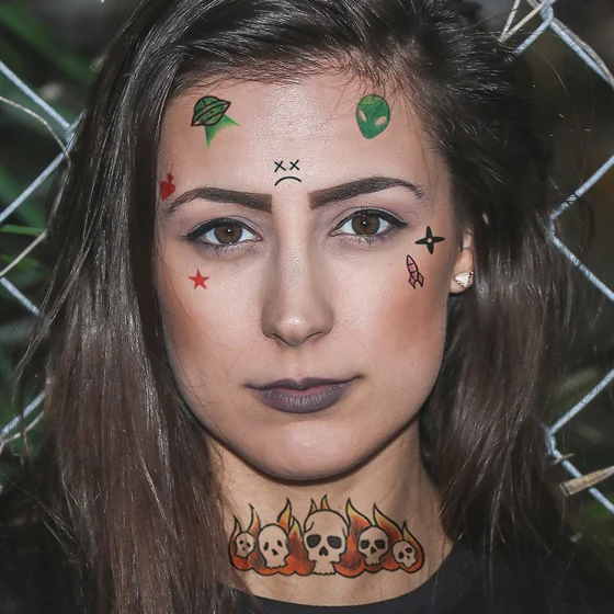 Ignorant patchwork alien and skull tattoos for women on face and neck