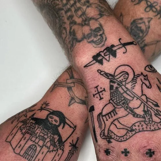 Ignorant patchwork tattoo idea for men: Saint Michael, skull, sword, castle on hand, forearm.