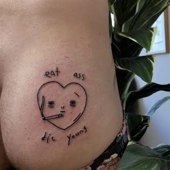 Ignorant style heart and quote tattoo design for ladies on hip