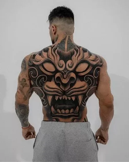 Japanese Black And Grey Oni Mask tattoo for men on back