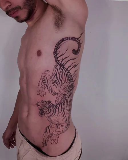 Japanese Black And Grey Tiger tattoo design for men on rib and hip