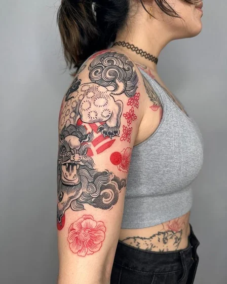 Japanese Dotwork Foo Dog and floral tattoo design for women on half sleeve
