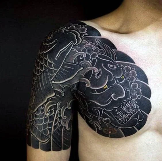 Japanese Koi Fish and Oni Mask tattoo design for men on shoulder and upper arm