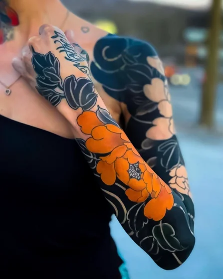 Japanese Neo-Traditional floral full sleeve tattoo idea for women