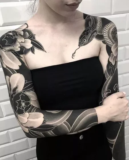 Japanese blackwork snake and floral full sleeve tattoo idea for women