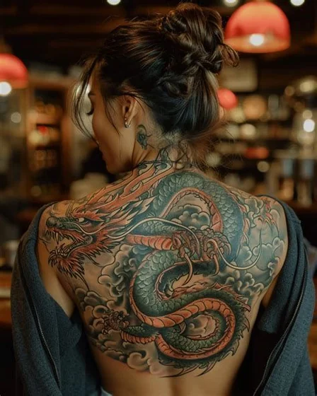 Japanese dragon and cloud tattoo design for women on back
