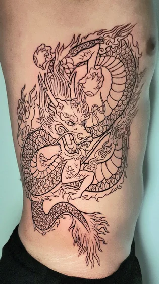 Japanese dragon and flame tattoo design for men on rib and hip tattoo ideas