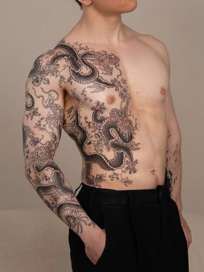 Japanese dragon and floral tattoo design for men on arm and chest