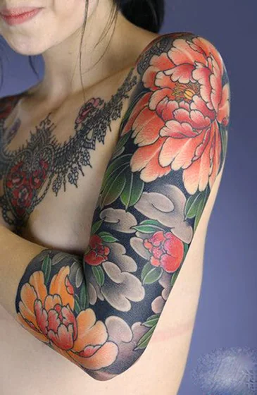 Japanese floral and cloud full sleeve tattoo design for women on arm and chest