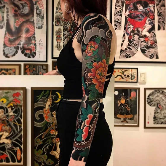 Japanese floral and snake full sleeve tattoo design for women