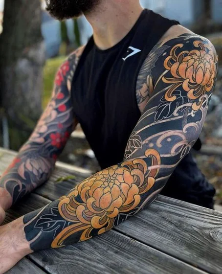 Japanese flower full sleeve tattoo idea for men on arm