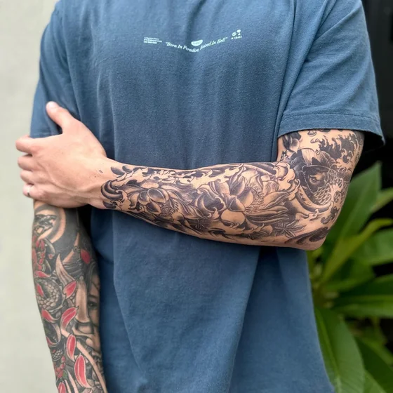 Japanese full sleeve tattoo for men: Koi Fish, Snake, Floral