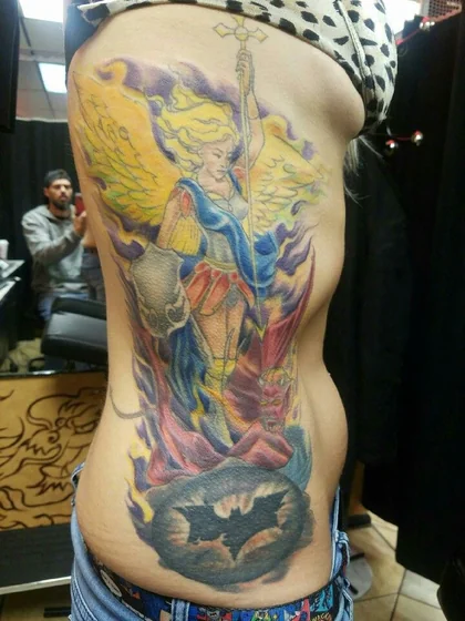 Lady's New School Saint Michael, Batman, Demon rib tattoo design