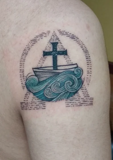 Linework Neo-Traditional cross, boat, ocean, Alpha Omega tattoo for men on shoulder