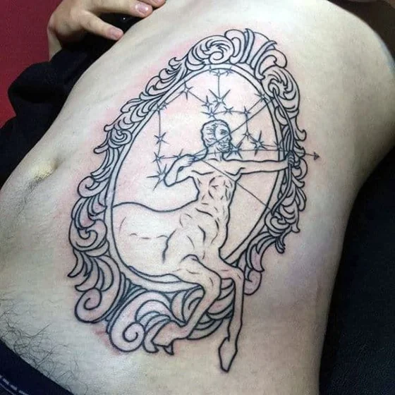 Linework Sagittarius and Star with Ornate Frame tattoo for men on rib