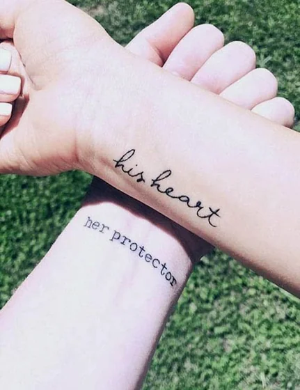Matching script heart word tattoo design for men & women on wrist