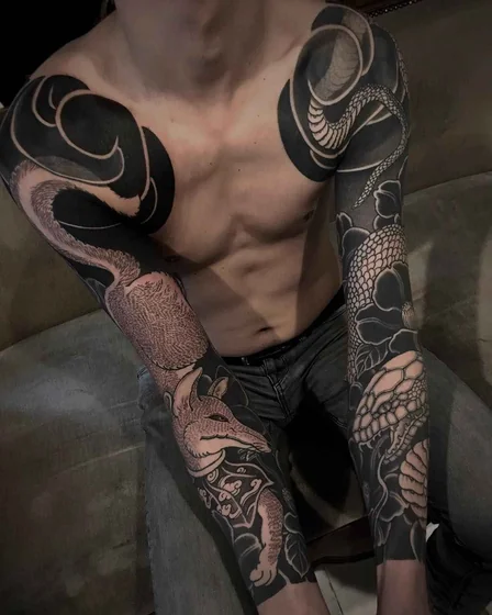 Men's Blackwork & Fine Line fox, snake, floral full sleeve tattoo idea