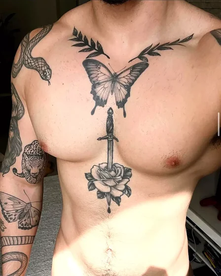 Men's Patchwork Black & Grey butterfly, rose, sword, leopard tattoo idea on chest.