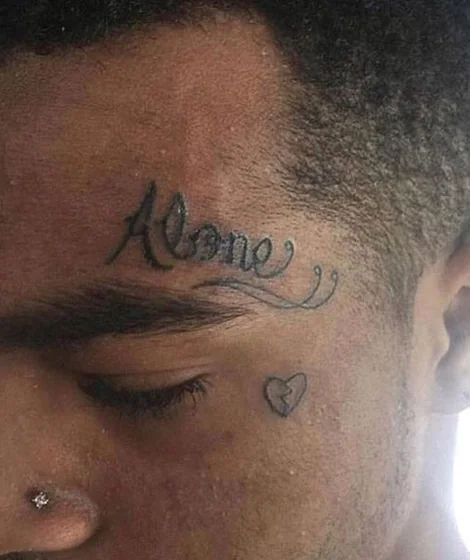 Men's fine line 'Alone' word and broken heart face tattoo design