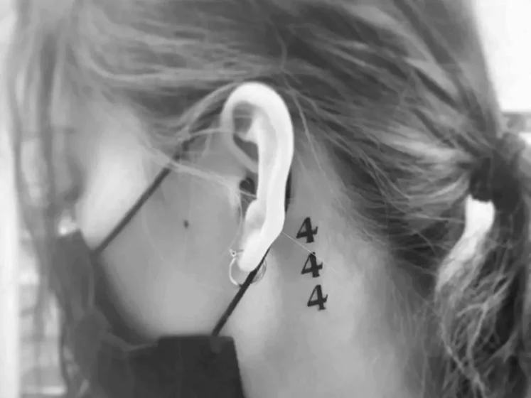 Minimalist 444 fine line tattoo design for women on neck behind the ear