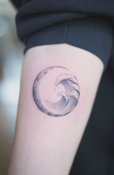 Minimalist Fine Line Moon and Ocean tattoo design for women on Upper Arm