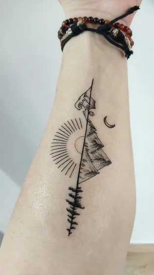 Minimalist Fine Line Sun Moon Mountain tattoo idea for men and women on forearm