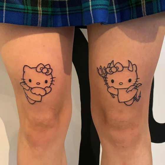 Minimalist Hello Kitty angel and devil tattoo for women on knee