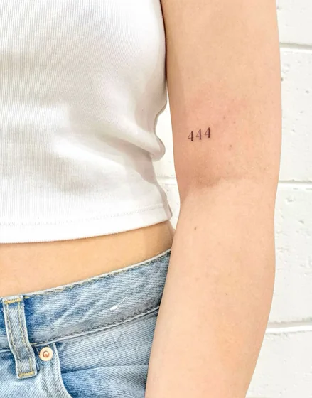 Minimalist fine line angel number 444 tattoo design for women on bicep tattoo ideas