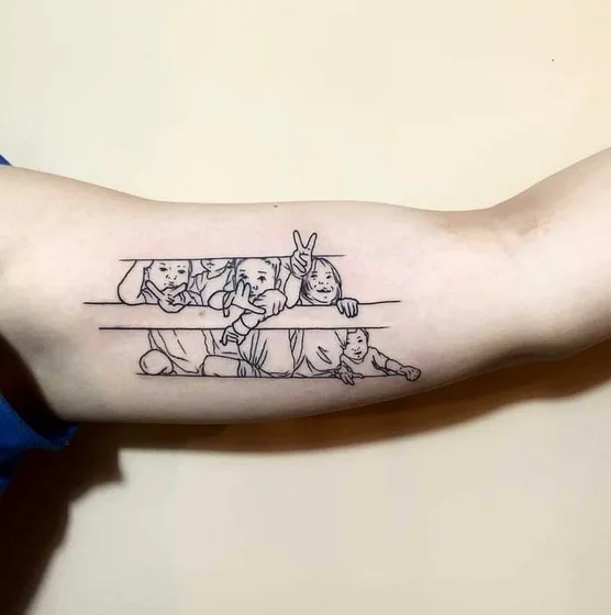 Minimalist fine line children tattoo design for women on bicep tattoo ideas