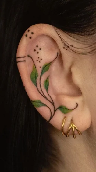 Minimalist fine line floral tattoo design for women