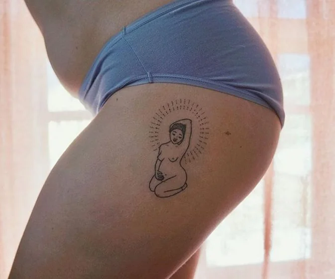 Minimalist fine line pregnant woman tattoo design for women on thigh