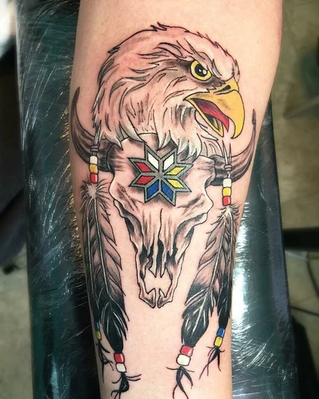 Neo-Traditional Eagle, Skull, Native American tattoo idea for men & women on forearm